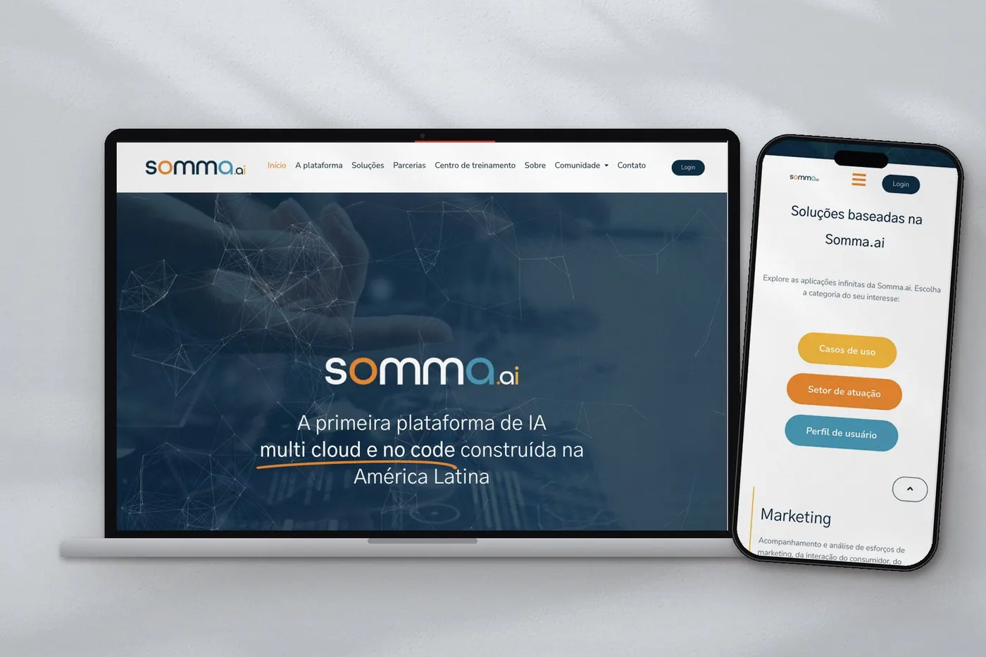 The Somma AI website on a laptop and a phone